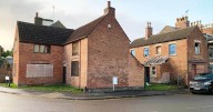 Man who let prominent buildings in Nottinghamshire village deteriorate over 30 years hit with fine