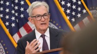 Powell signals Federal Reserve to move slowly on interest rate cuts