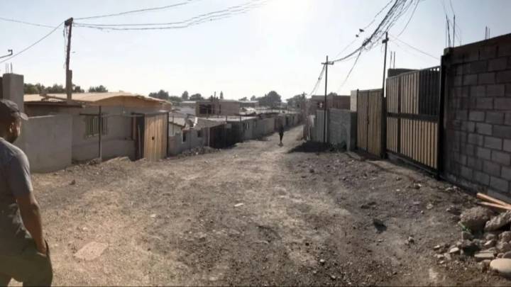 Habitantes de una comuna ilegal en Chile improvisan medidas de seguridad tras muerte de venezolano
