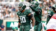 Michigan State linebacker Wayne Matthews taken away in ambulance after scary injury