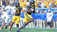 Edwards' short TD run in overtime leads West Virginia over Pittsburgh 31