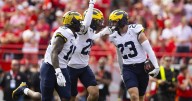 No. 21 Michigan uses 3 long TD runs to beat Nebraska 30-27, extend Huskers' skid against Top 25 foes