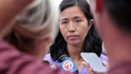 Lawsuit: Ex-city hall staffer fired for airing 'intraoffice philandering'