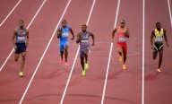 Athletics-Lyles makes smooth start to 200m bid