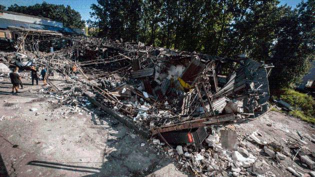 As Trump heads to Europe, Russian drones hit Kyiv and Zelenskyy urges sanctions