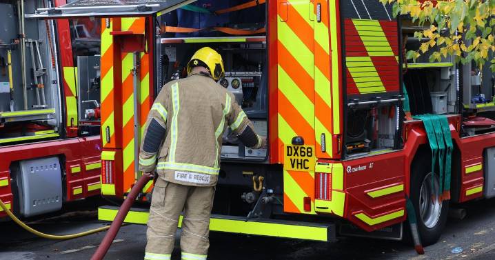 Car on roof after bicycle crash