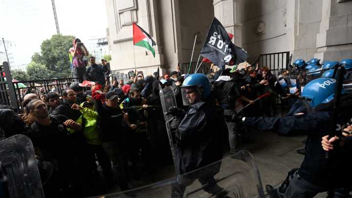 Pro-Palestine riots break out in Italy as metal ladders are thrown into windows & protesters storm iconic train station