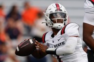 Bell, Edwards each rack up over 100 yards, UConn gets by Ball State 31