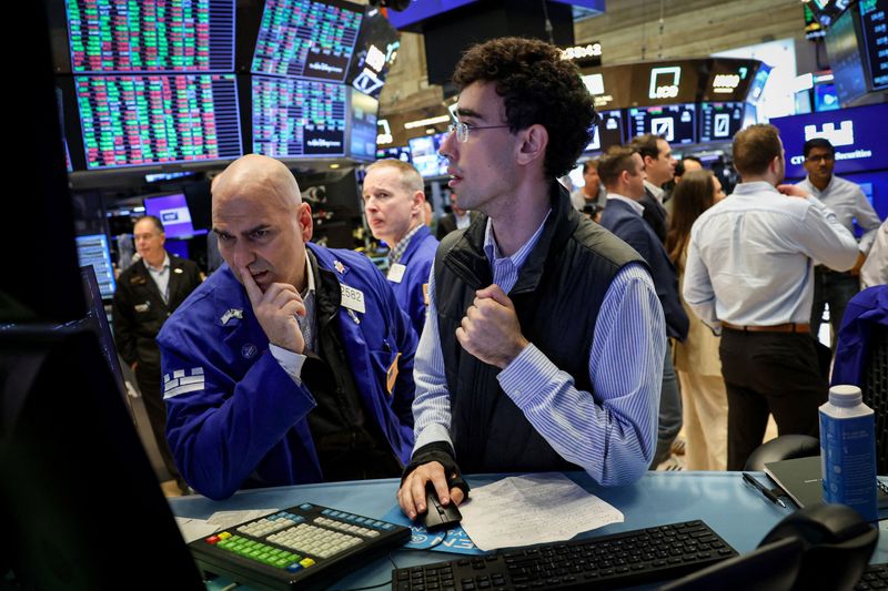 S&P 500, Nasdaq hit record highs ahead of Fed meeting; Tesla jumps