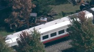 1 hurt after Amtrak train hits construction vehicle in Chicago suburbs, police say