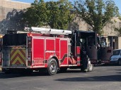 Burning backyard trees, structure threaten homes in Fairfield