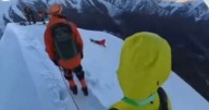 Shocking moment mountaineer dies in 650ft fall while trying to take selfie
