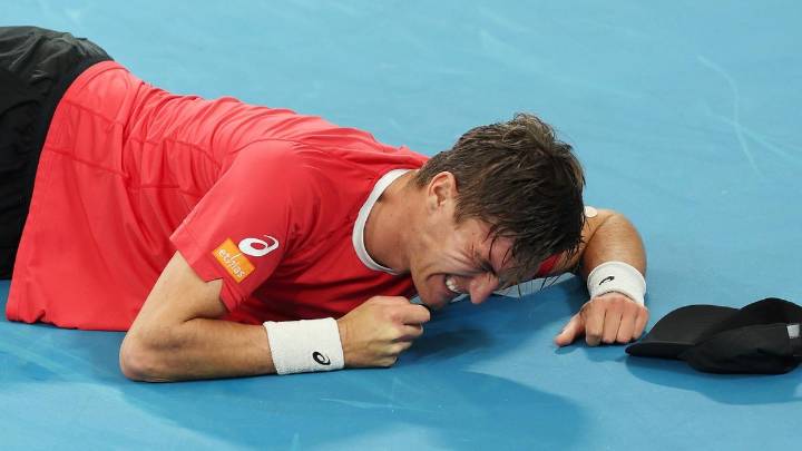Legend fumes as Alex de Minaur match descends into ‘barbaric’ scene for cramping winner Raphael Collignon