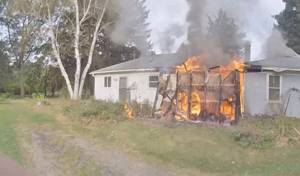 Firefighters rescue 76-year-old man from burning home