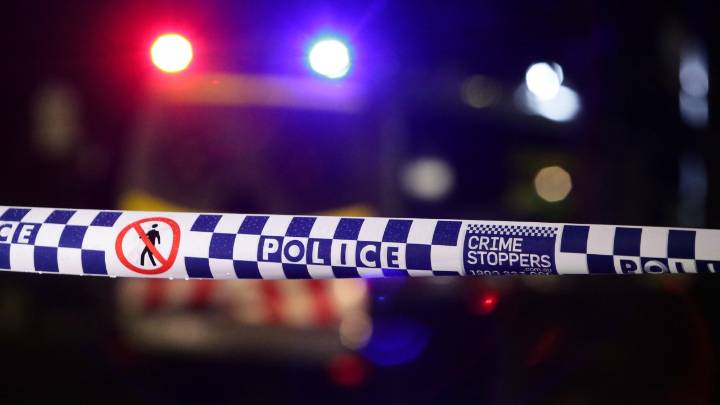Baby boy dead, woman seriously injured after ute crashes into parked car on motorway in Gaven, on the Gold Coast