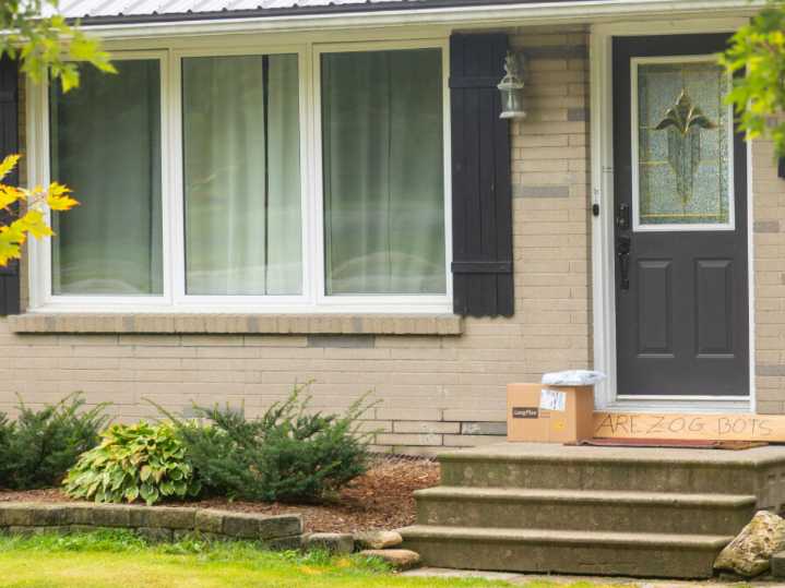 Two Ontario residents facing hate-related charges after swastika mowed into front lawn