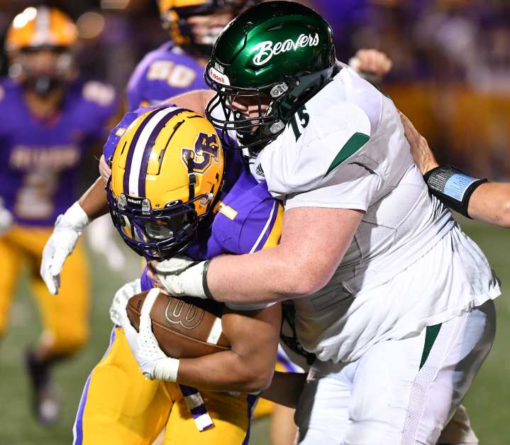 Woodland’s defense calms Columbia River’s run, 17