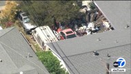 Mounds of clutter outside Huntington Beach home creates eyesore for neighborhood, over 39 complaints filed by neighbors