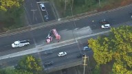 Dump truck full of gravel overturns in Clifton creating traffic mess near site of cooking oil spill