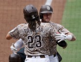 Padres go up big, hold on to beat Rockies