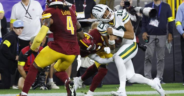 Love, Kraft lead the way in Packers' 27-18 victory over Commanders