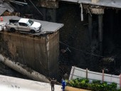 Massive sinkhole in Bangkok street forces evacuations
