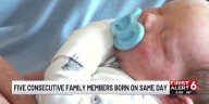 Five consecutive family members born on same day