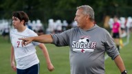 Andy Steger is back on a De Pere soccer sideline after two years away