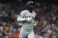 Yankees' All-Star infield exits game with double knee contusion
