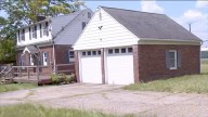 Coroner rules deaths of father, son in Howland Township home accidental