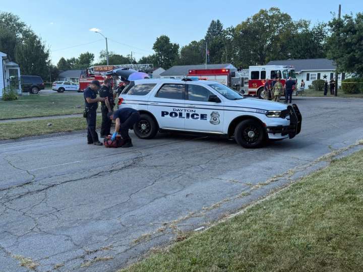 Vehicle hits motorcycle, crashes into local home