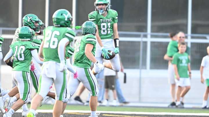 Yorktown football breaks in new field with big victory over New Castle