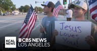 Dozens gather on 210 Freeway overpass to remember conservative activist Charlie Kirk