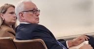 Top court pick denies his aim is to sink ed. funding decision
