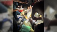 Shocking alleged tomahawk attack caught on phone as Loganlea neighbourhood dispute turns violent