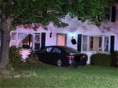 Car strikes house in Lakeville