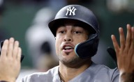 Giancarlo Stanton strikes a deal with young Yankees fan to get back his 450th home run ball