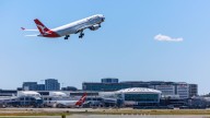 Crime scene set up after worker crushed to death at Sydney Airport's freight handling terminal in shock incident