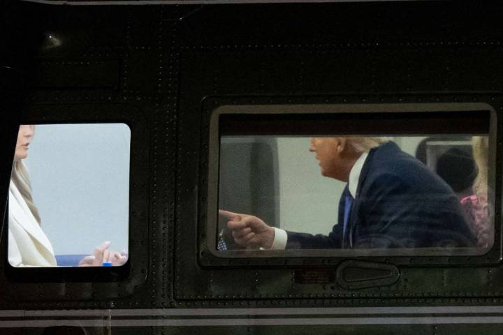 Donald and Melania Trump Spotted in Animated Conversation on Marine One