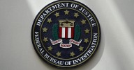 FBI fires agents photographed kneeling during 2020 racial justice protest, AP sources say