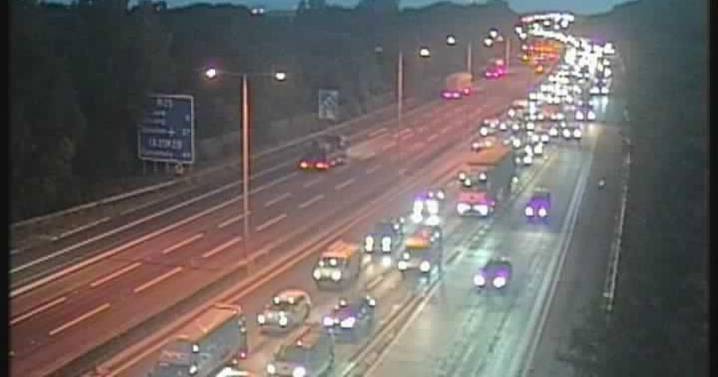 Commuter chaos as major UK motorway closed due to 'lorry hitting a bridge'