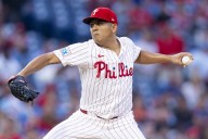Schwarber hits 50th homer and Suárez strikes out 12 as Phillies extend lead over Mets with 9