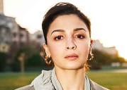Alia Bhatt stuns in dramatic fur coat and net stockings
