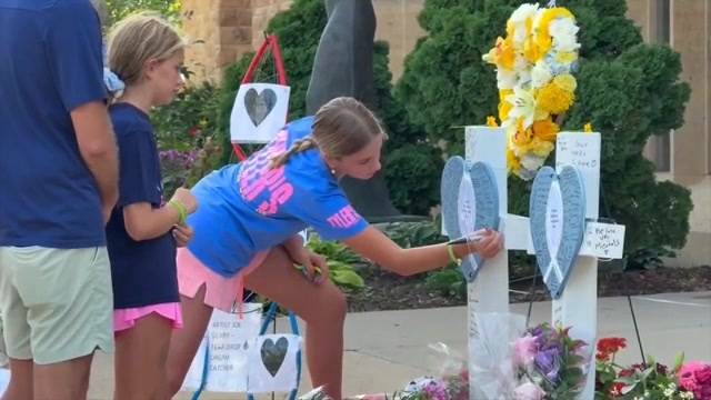 A community gathers for the first weekend of Masses after Minneapolis shooting as questions remain