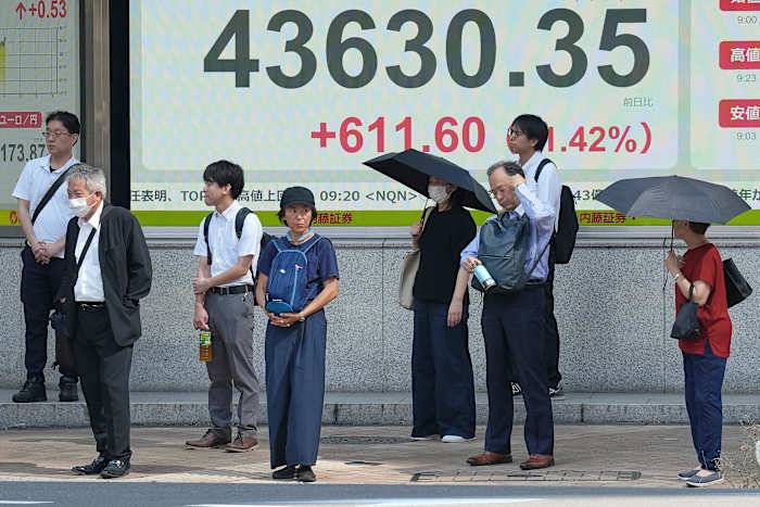Asian shares rise after Japan's prime minister resigns