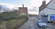 Police investigation launched after firefighters battle Cambridgeshire shop blaze