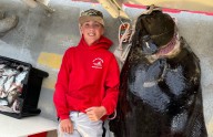 N.H. teen fishing off New England coast catches huge halibut bigger than him
