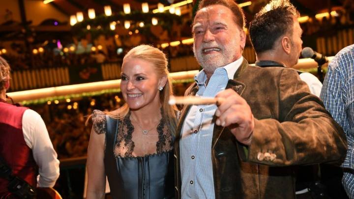 Schwarzenegger directs a band in a beer tent at Munich’s Oktoberfest