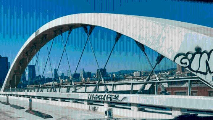 Copper theft, graffiti plague the now dark 6th Street Bridge in Los Angeles