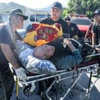 Taiwan races to rescue two dozen missing after barrier lake burst